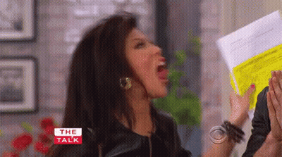 Woman Screaming Holding Paper GIF