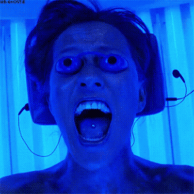 Woman Screaming Into Microphone With Headphones GIF
