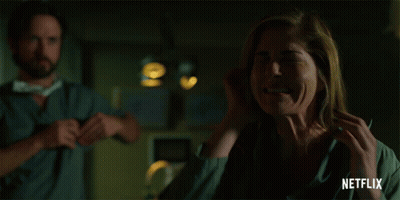 Woman Screaming Man Holds Head Netflix Ad GIF