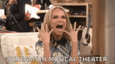 Woman Screaming On Couch In Musical Theater GIF
