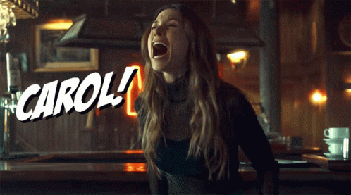 Woman Screaming With Word Carol Above GIF
