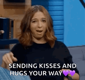 Woman Sending Kisses And Hugs GIF