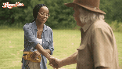 Woman Shaking Hands With Older Man Moonshine GIF