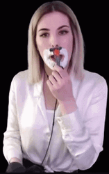 Woman Shaving Her Face GIF