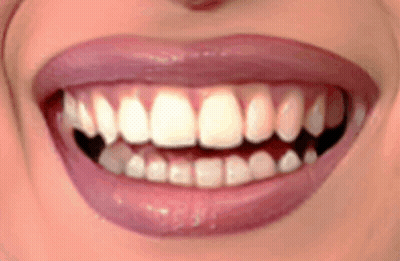 Woman Showing Teeth And Pink Lips GIF