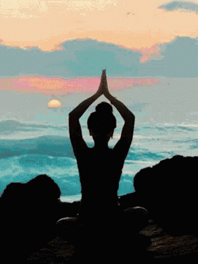 Woman Silhouette Meditating On Beach GIF