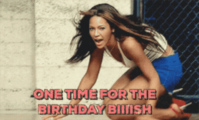 Woman Singing Happy Birthday Into Microphone On Stage GIF