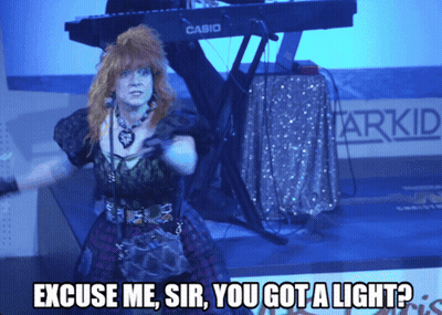 Woman Singing In Front Of Keyboard Says Excuse Me Sir You Got A Light GIF