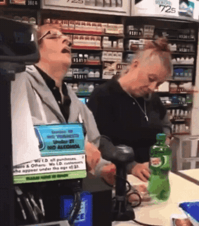 Woman Singing In Front Of No Alcohol Sign GIF