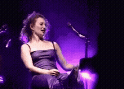 Woman Singing In Purple Dress GIF