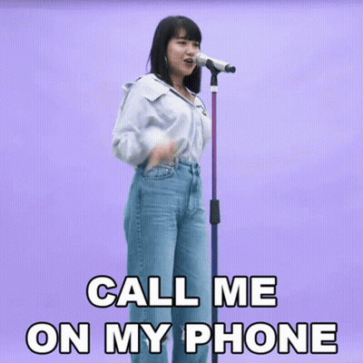 Woman Singing Into Mic Call Me On My Phone GIF