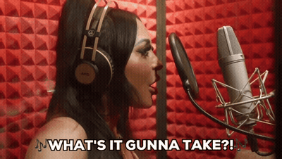 Woman Singing Into Mic Saying What's It Gunna Take GIF