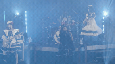 Woman Singing Into Microphone GIF