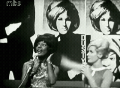 Woman Singing Into Microphone GIF
