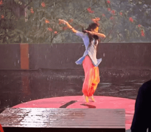 Woman Singing Into Microphone And Dancing GIF