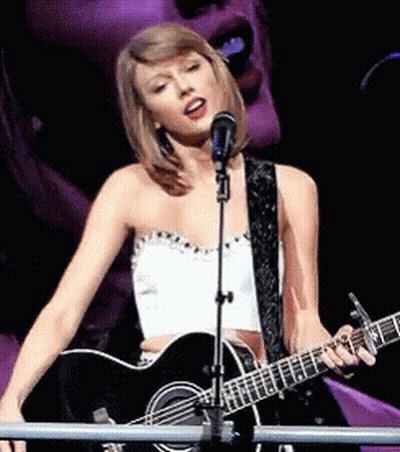 Woman Singing Into Microphone And Guitar GIF