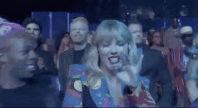 Woman Singing Into Microphone At Concert GIF