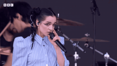 Woman Singing Into Microphone BBC GIF