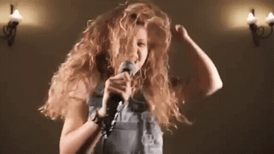 Woman Singing Into Microphone GIF