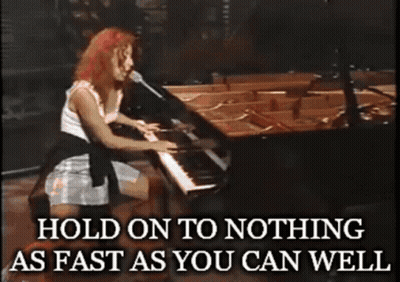 Woman Singing Into Microphone Hold On To Nothing GIF