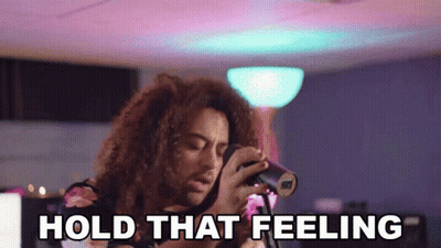 Woman Singing Into Microphone Hold That Feeling GIF