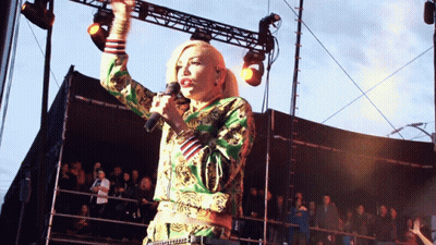 Woman Singing Into Microphone GIF