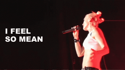Woman Singing Into Microphone I Feel So Mean GIF