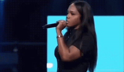 Woman Singing Into Microphone GIF