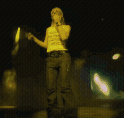 Woman Singing Into Microphone In I Love You Shirt GIF