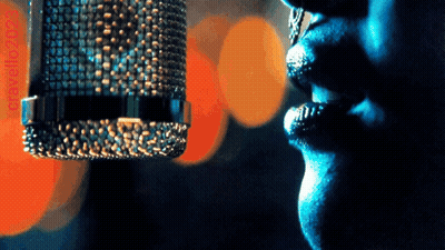 Woman Singing Into Microphone GIF