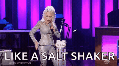 Woman Singing Into Microphone Like A Salt Shaker GIF