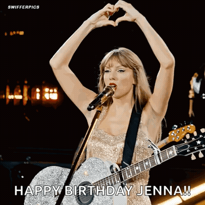 Woman Singing Into Microphone Making Heart Shape Holding Guitar GIF