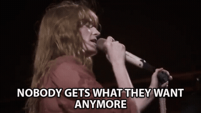 Woman Singing Into Microphone Man Playing Piano GIF