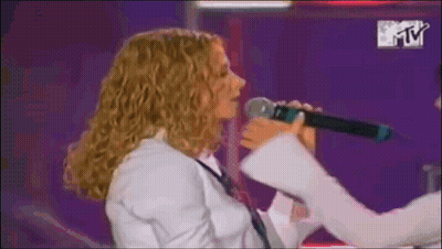Woman Singing Into Microphone MTV Logo GIF