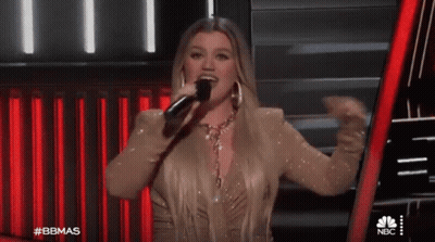 Woman Singing Into Microphone NBC GIF
