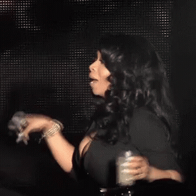 Woman Singing Into Microphone On Stage GIF