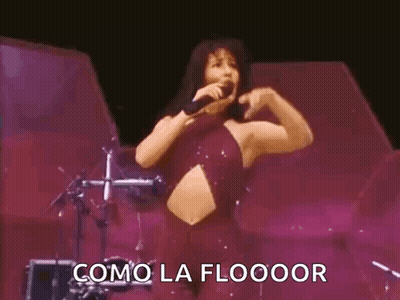 Woman Singing Into Microphone On Stage GIF