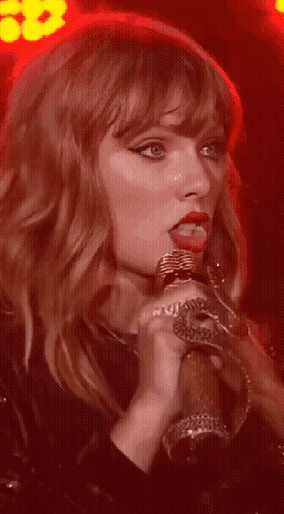 Woman Singing Into Microphone Red Lights GIF