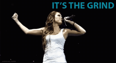 Woman Singing Into Microphone Saying It's The Grind GIF