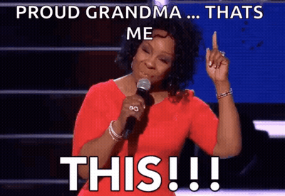 Woman Singing Into Microphone Saying Proud Grandma That's Me GIF