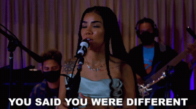 Woman Singing Into Microphone Saying You Said You Were Different GIF