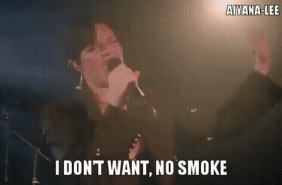 Woman Singing Into Microphone Says I Don't Want No Smoke GIF