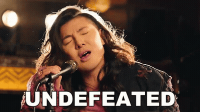 Woman Singing Into Microphone Undefeated GIF