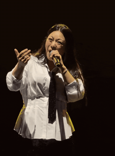 Woman Singing Into Microphone White Shirt And Tie GIF