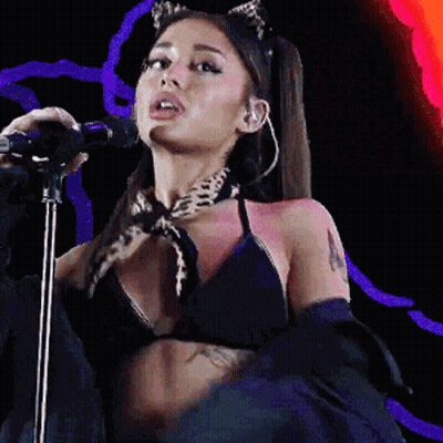 Woman Singing Into Microphone With Cat Ear Headband GIF