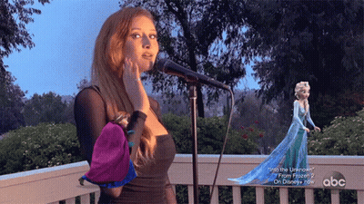 Woman Singing Into Microphone With Disney Character GIF