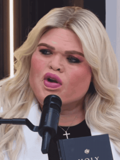 Woman Singing Into Microphone With Holy Book GIF