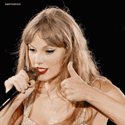 Woman Singing Into Microphone With Thumbs Up GIF