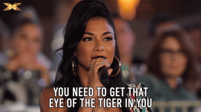 Woman Singing Into Microphone You Need To Get That Eye Of The Tiger In You GIF