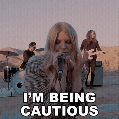 Woman Singing Microphone I'm Being Cautious GIF